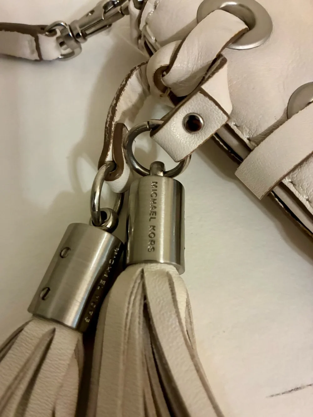 Michael Kors Astor Grommet Laced Tassel shoulder Bag  Off White